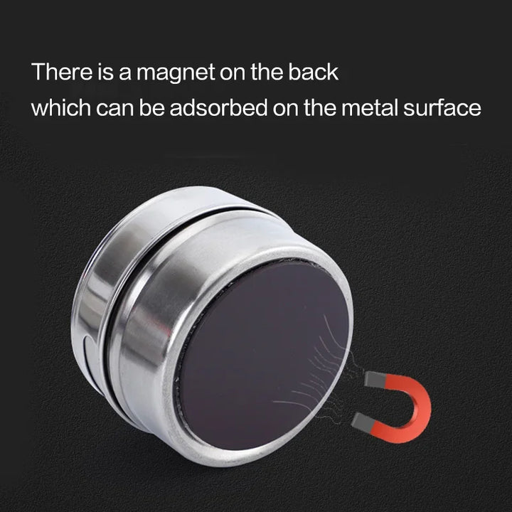 Magnetic stainless steel spice jars set on wall rack